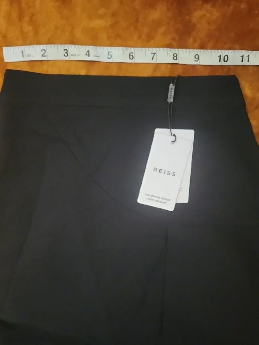 Reiss Black Mini Skirt with Curved Panel Detail
